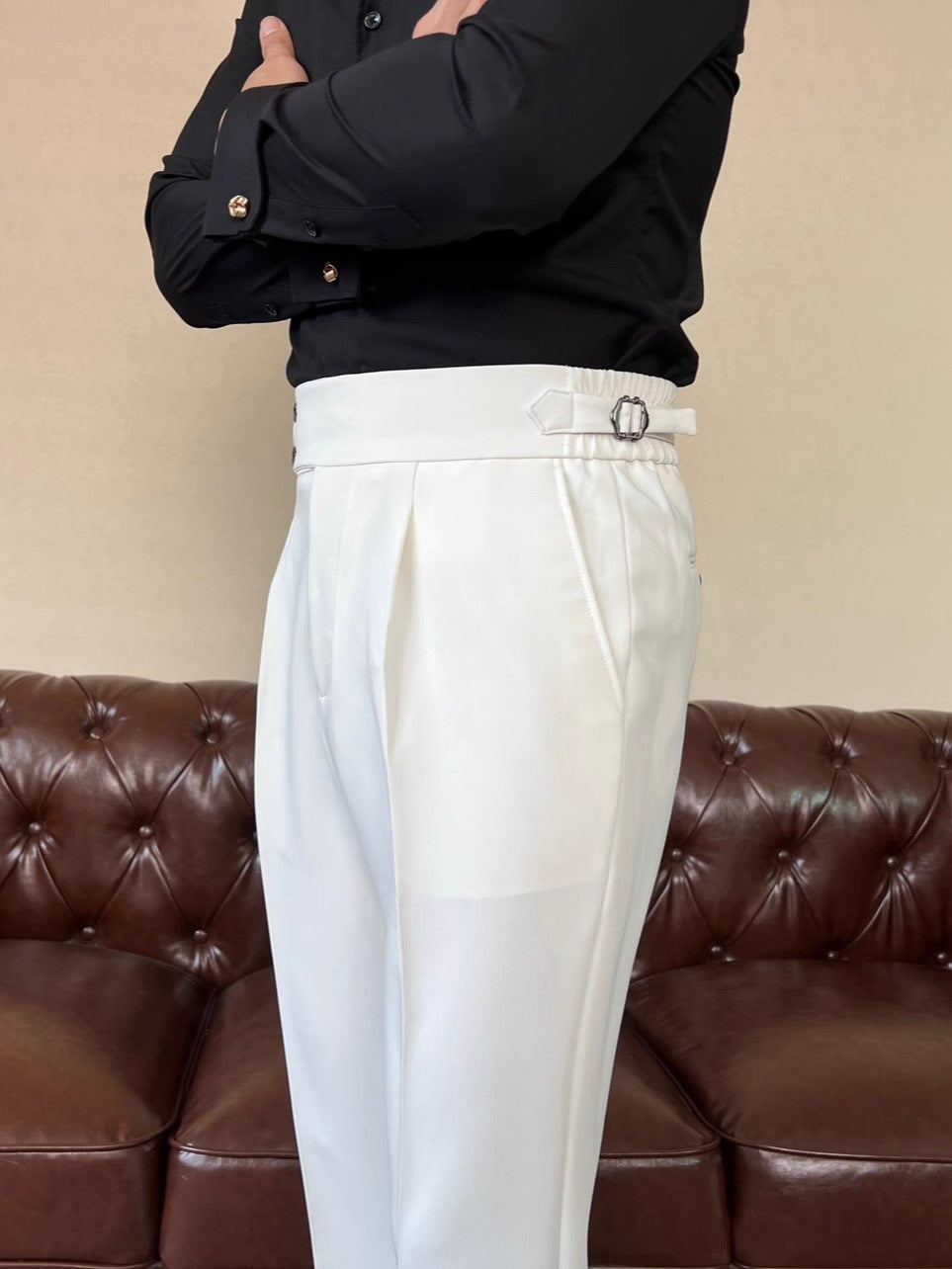 The Salerno Trouser - Draped high-waist tailoring with a cropped nine-point leg and no-iron finish