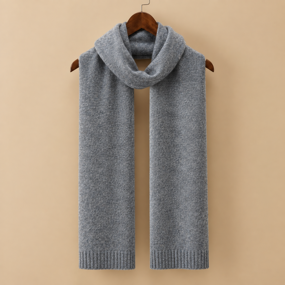 The Cranleigh Cashmere Scarf in Slate on a hanger