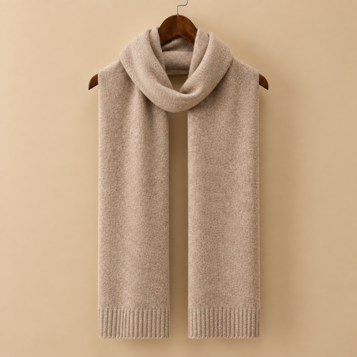 The Cranleigh Cashmere Scarf in Camel on a hanger