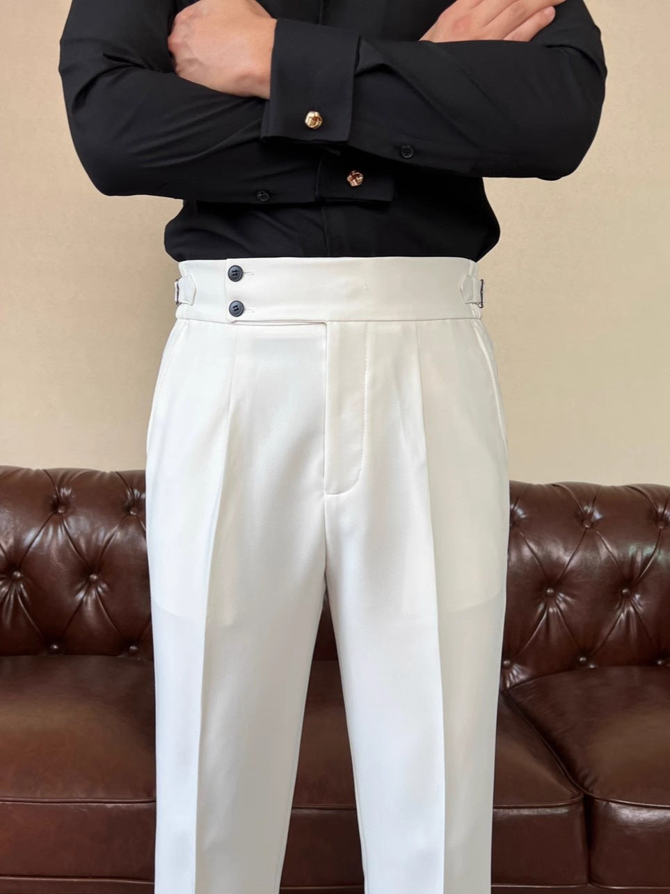The Salerno Trouser - Draped high-waist tailoring with a cropped nine-point leg and no-iron finish