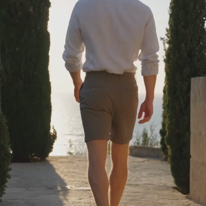 The Windsor Short - Tailored five-point cut with rolled cuffs in a drapey wrinkle-resistant blend